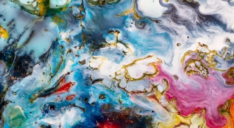 Abstract painting with swirling blues, pinks, golds and whites