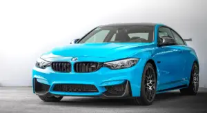 Blue BMW car in a studio setting, ready for detailing.