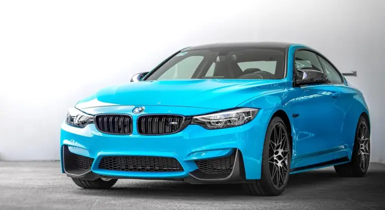 Blue BMW car in a studio setting, ready for detailing.