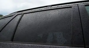 Close-up of water droplets on a car window
