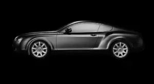 Side profile of a sleek car against a solid black background, representing car customization options.