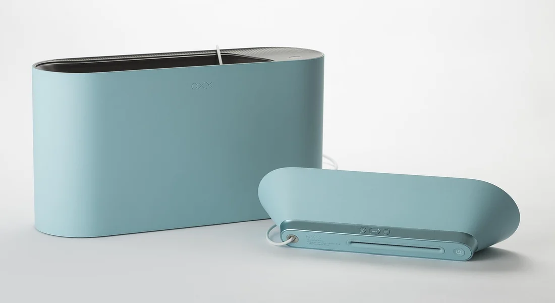 Teal steam cleaner with a base unit and a handheld wand, set against a light background, designed for exterior car detailing.