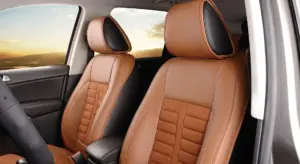 Interior of a car with tan leather seats and matching headrests